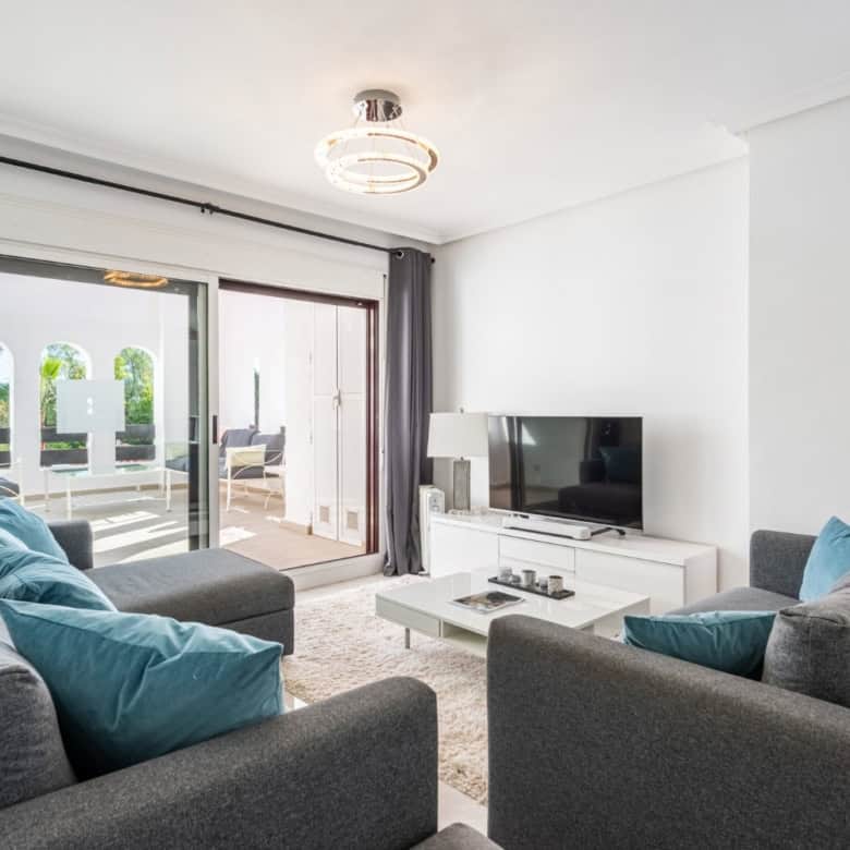 Spacious corner apartment with 3 bedrooms, bright living area, and balcony in La Maestranza, Nueva A.
