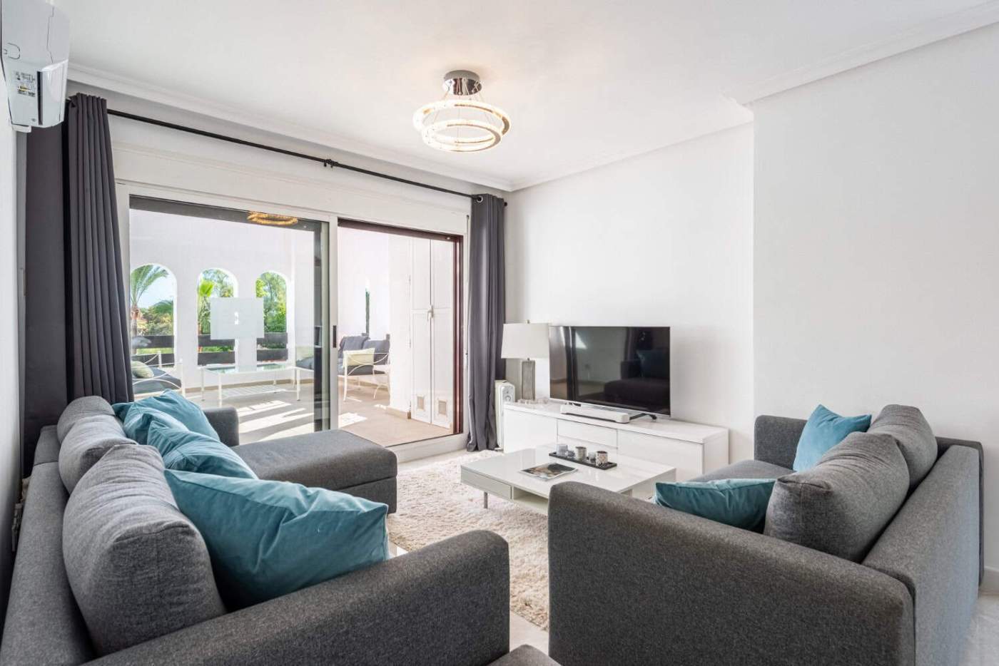 Spacious corner apartment with 3 bedrooms, bright living area, and balcony in La Maestranza, Nueva A.