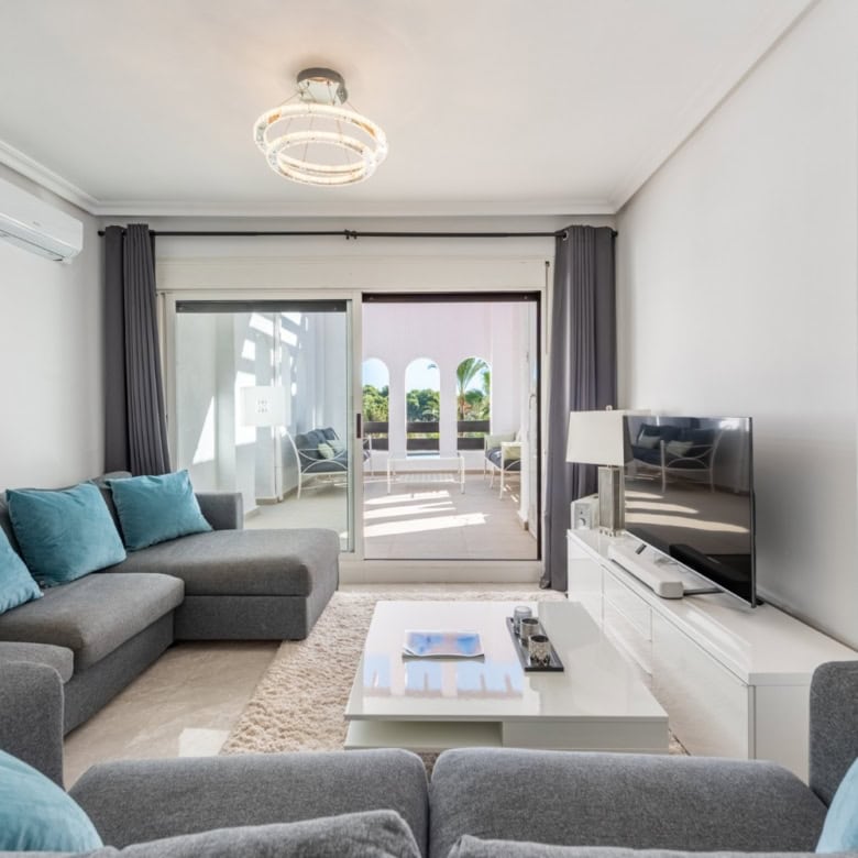 Spacious corner apartment with 3 bedrooms, bright living area, and balcony views in La Maestranza, A.