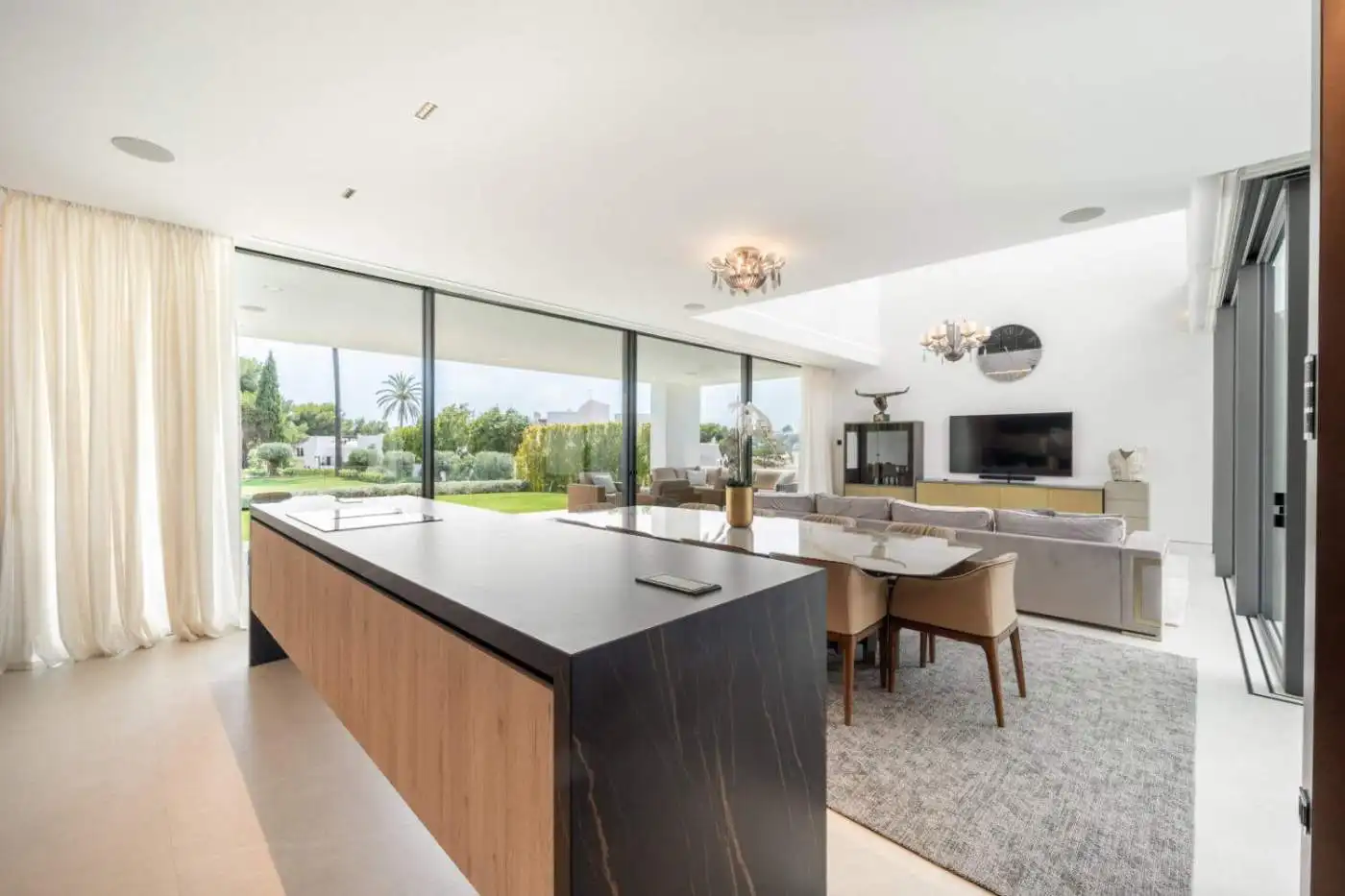 Modern semi-detached villa featuring a rooftop pool and scenic views in Nueva Andalucía.