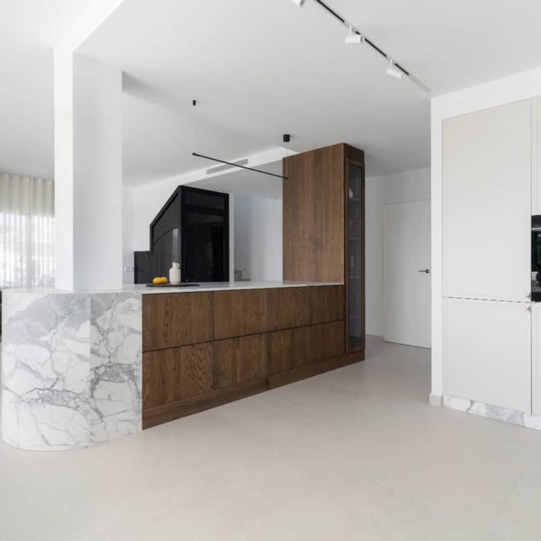 Bright and spacious duplex penthouse with contemporary design and open-plan living area.
