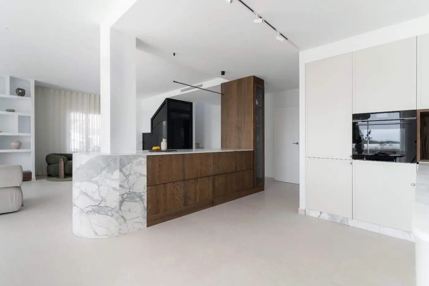 Bright and spacious duplex penthouse with contemporary design and open-plan living area.