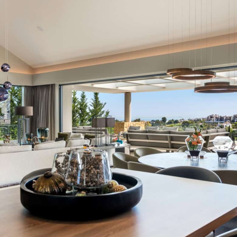 Elegant modern villa interior with spacious living area and panoramic views in Los Flamingos Resort.
