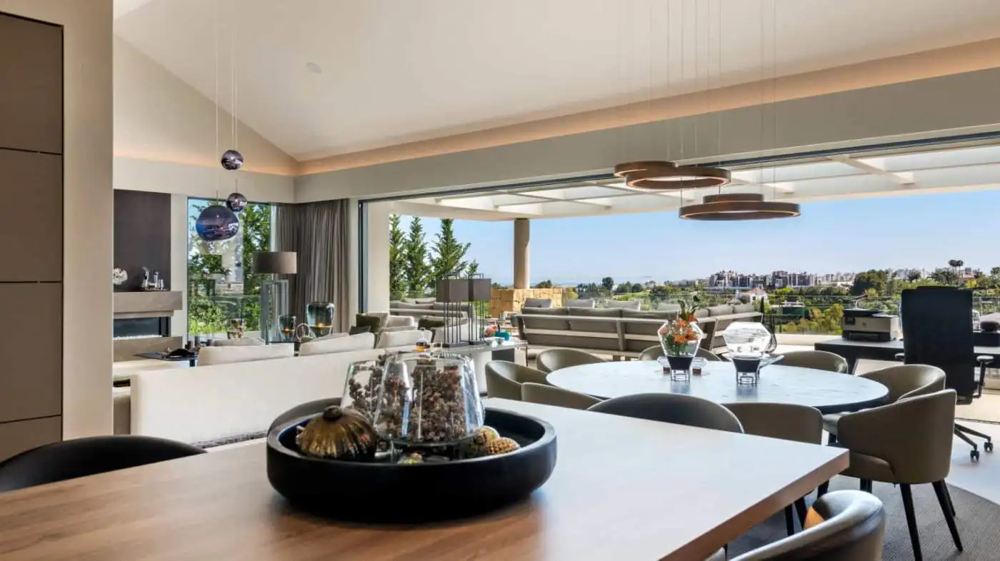Elegant modern villa interior with spacious living area and panoramic views in Los Flamingos Resort.