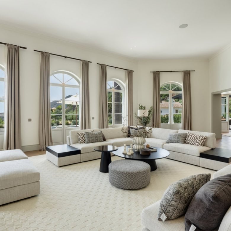 Elegant living room with large windows and scenic views in La Zagaleta.