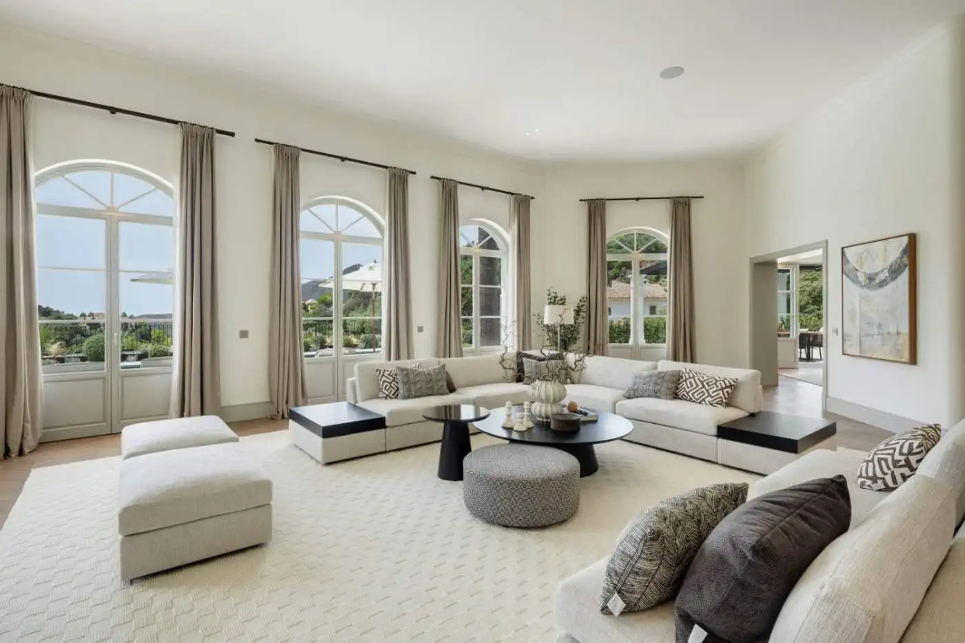 Elegant living room with large windows and scenic views in La Zagaleta.