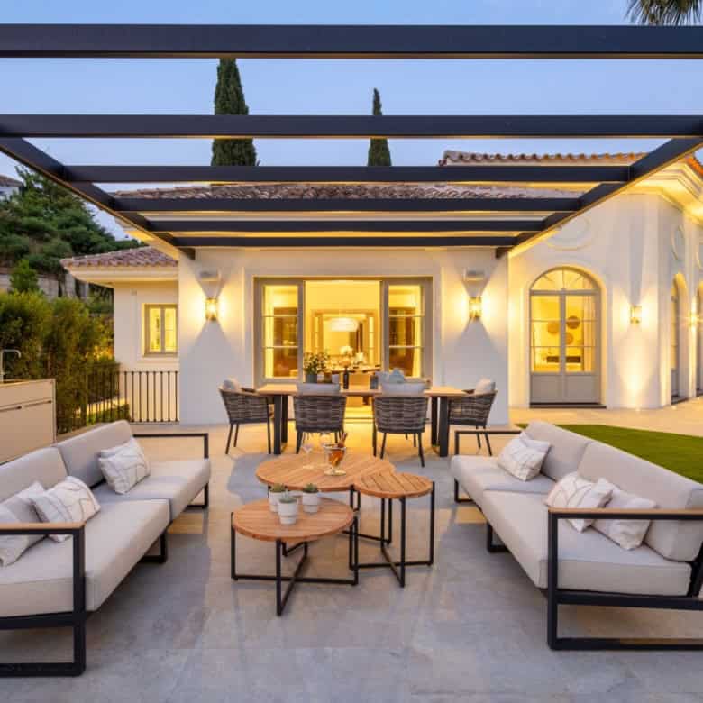 Contemporary villa with outdoor seating area in La Zagaleta, offering modern design and elegant outd.