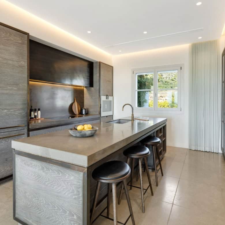 Luxury mansion kitchen with modern design and panoramic views in Marbella Club Golf Resort.