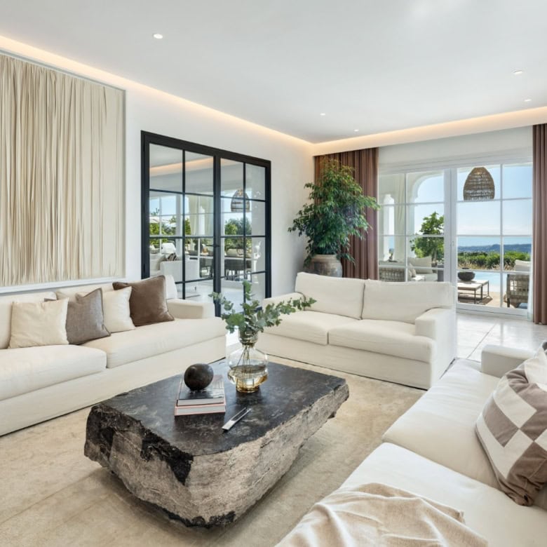 Elegant living room with panoramic sea views in Marbella Club Golf Resort.