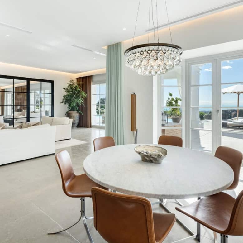 Elegant Marbella mansion with panoramic views in a prestigious golf resort. Modern interiors and spa.