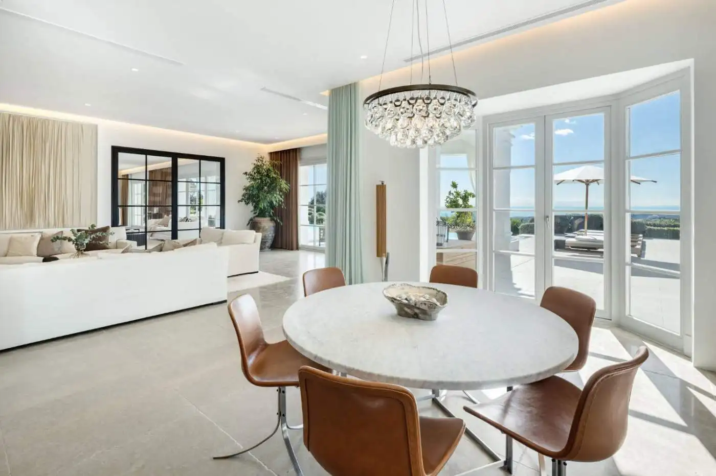 Elegant Marbella mansion with panoramic views in a prestigious golf resort. Modern interiors and spa.