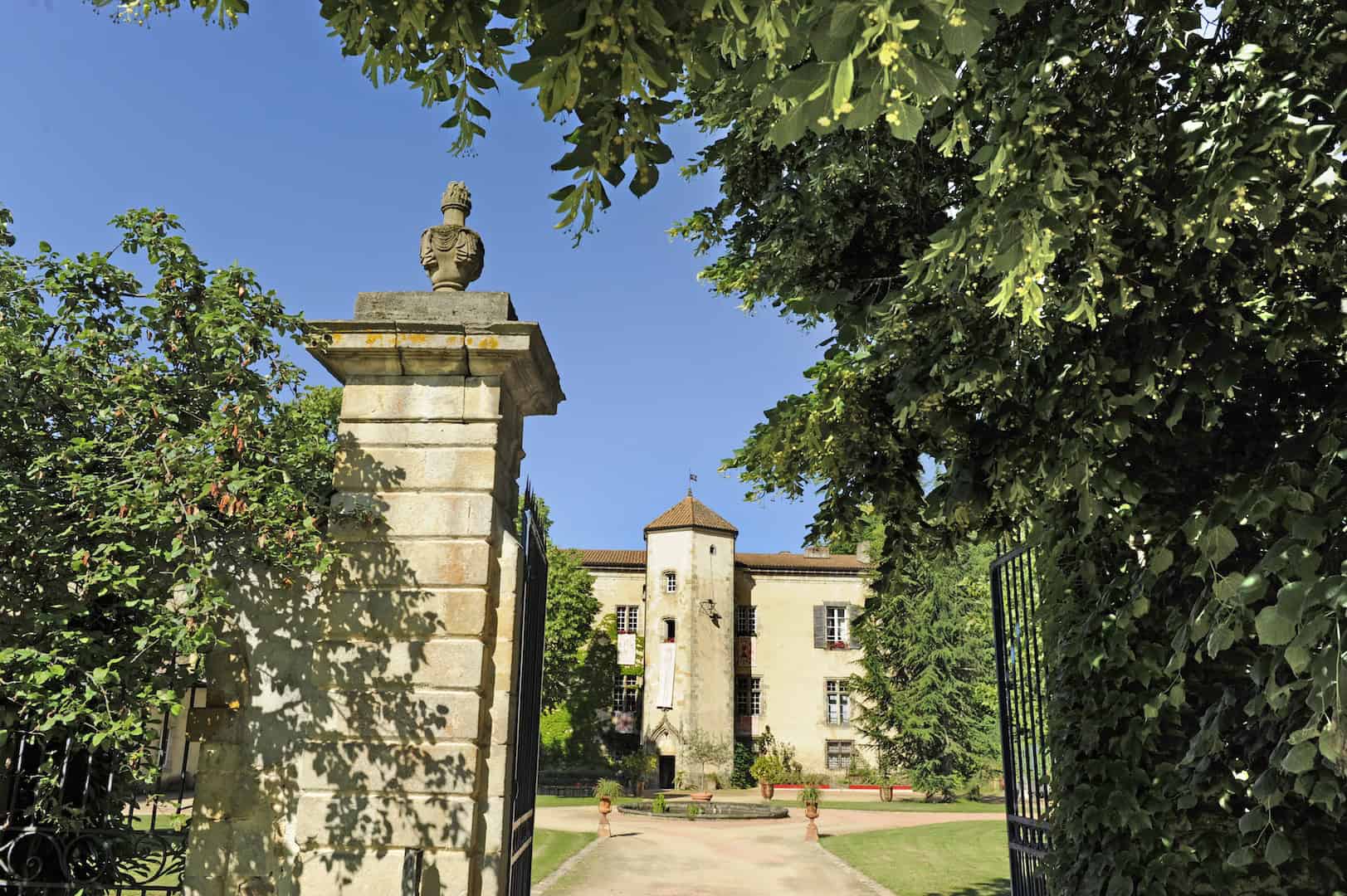 Stunning Château de la Chassaigne in Thiers, France Château de la Chassaigne with lush gardens and historic architecture in Thiers, France.