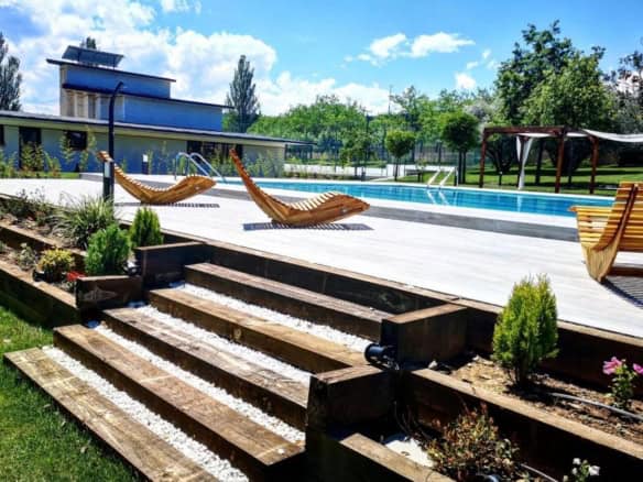 Luxury Finca Vivaldi Hotel Pool with sun loungers in Leon, Spain.