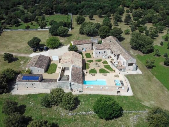 Luxury 10-bedroom estate in Goudargues, France, with expansive grounds and modern amenities.