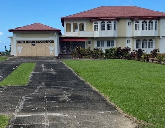 Elegant 8-bedroom estate for sale in Portland Port Antonio, Jamaica. Spacious home with lush gardens.