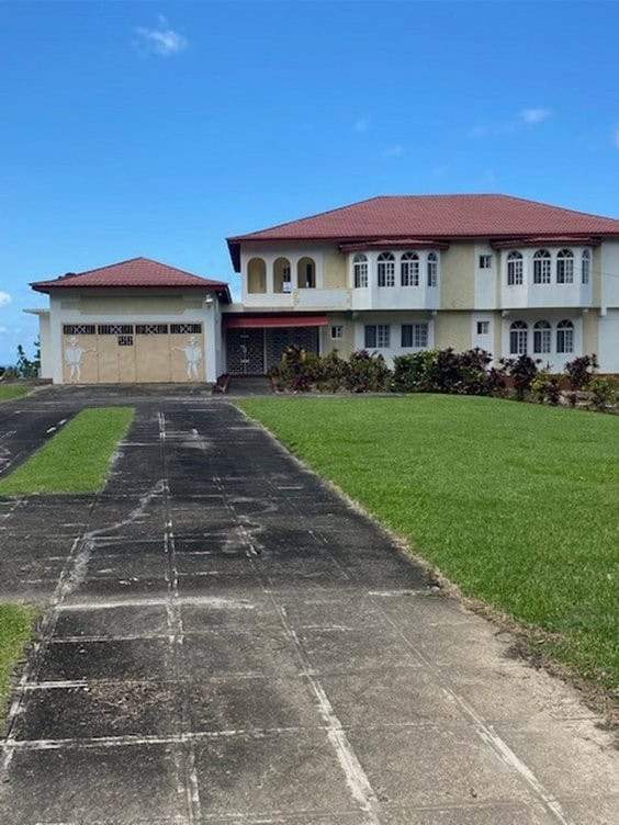 Elegant 8-bedroom estate for sale in Portland Port Antonio, Jamaica. Spacious home with lush gardens.