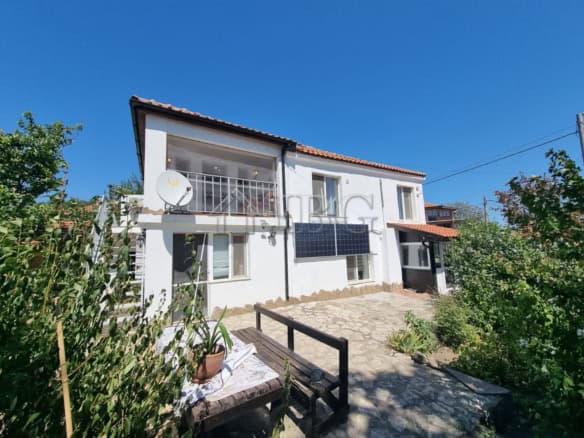 Two-storied house for sale, 34 km from Sunny Beach, featuring a spacious garden and modern amenities.