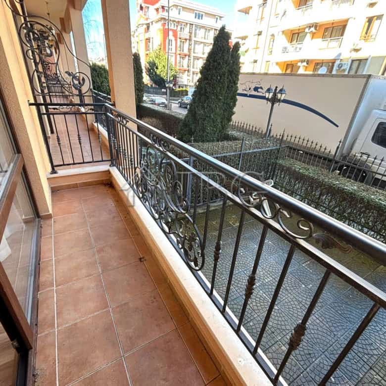 Balcony with wrought iron railing overlooking the street in Diamant Residence, Sunny Beach. Perfect.