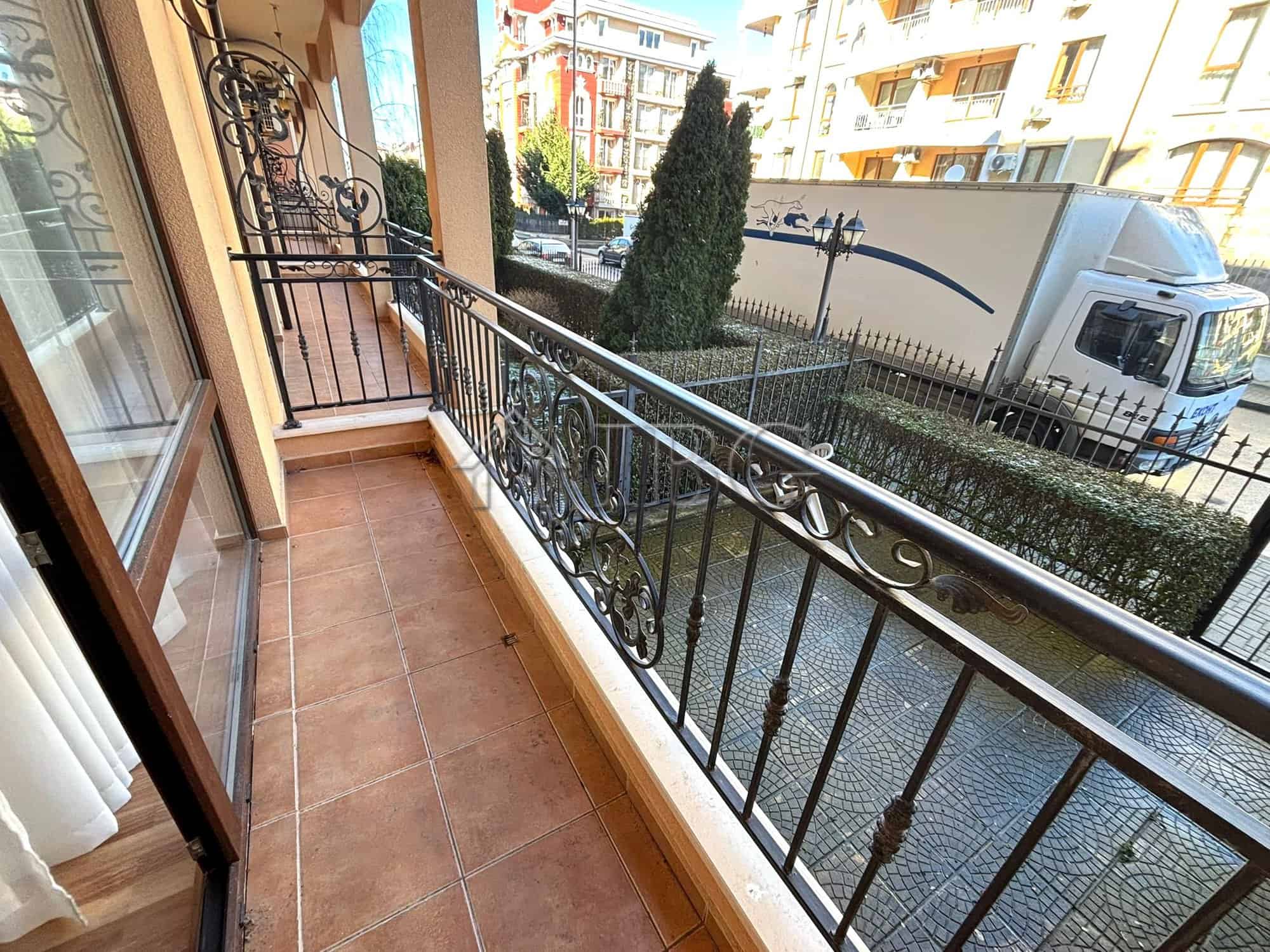 Cozy balcony in Diamant Residence, Sunny Beach Balcony with wrought iron railing overlooking the street in Diamant Residence, Sunny Beach. Perfect.