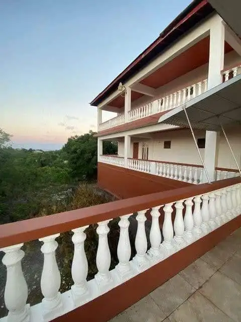Sea view living room in Portland, Jamaica with contemporary furniture.