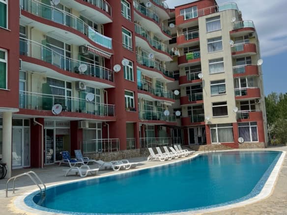 Apartment building with pool and balconies in Sunny Beach, Bulgaria.
