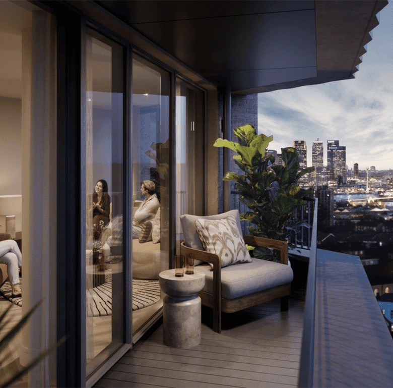 Modern apartment balcony overlooking London skyline at Woolwich Tower.