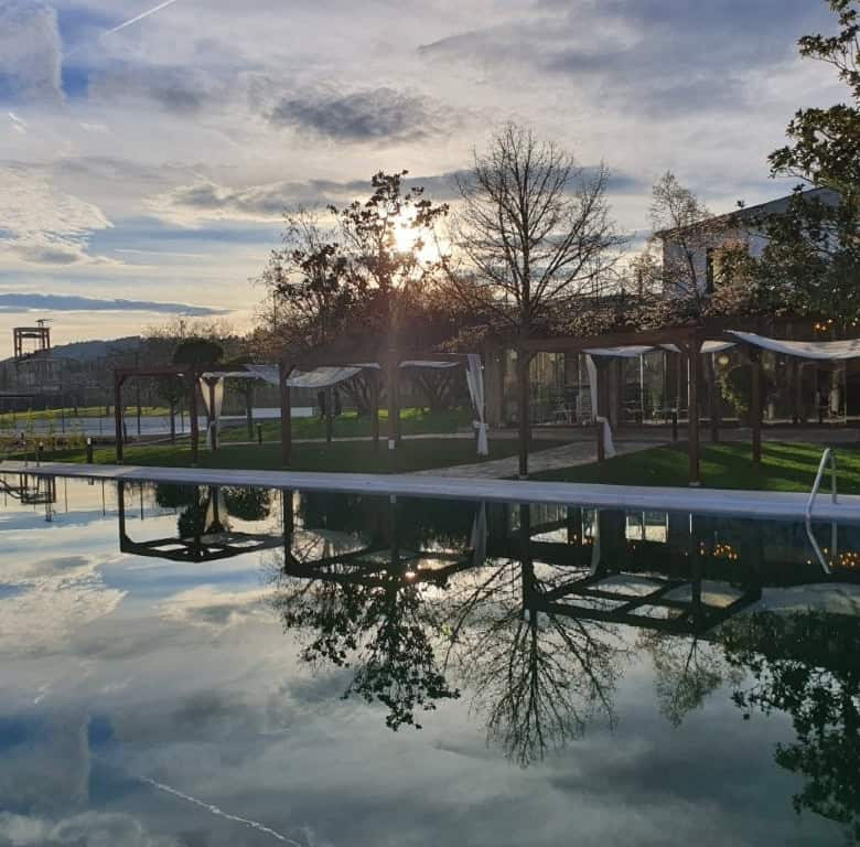 Beautiful view of the Vivaldi Hotel pool and surrounding landscape in Leon, Spain.