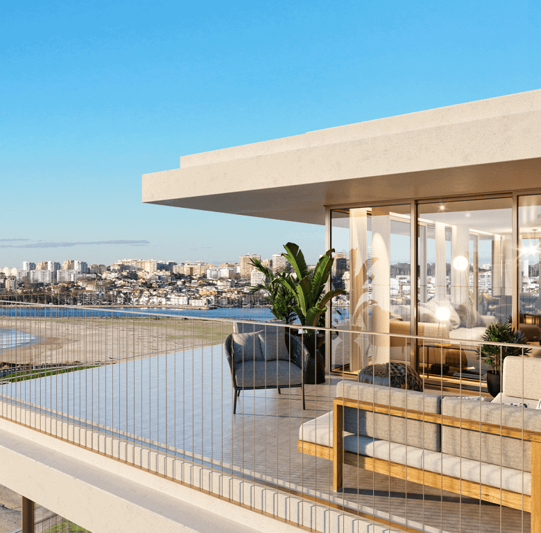 Balcony view of Douro Atlantico in Porto, Portugal, with modern outdoor furniture and cityscape back.