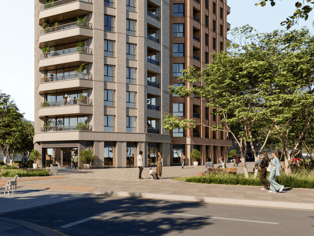 High-rise apartment complex with balconies and retail space at street level.