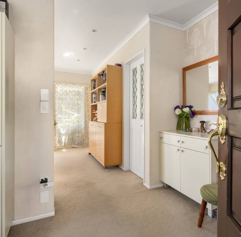 Bright and welcoming entrance hall of a charming cottage estate in Tauranga, Bay of Plenty, New Zeal.