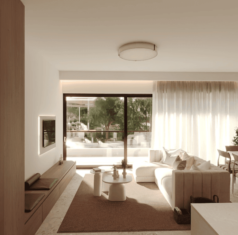 Modern Algarve living room with large window and stylish decor.