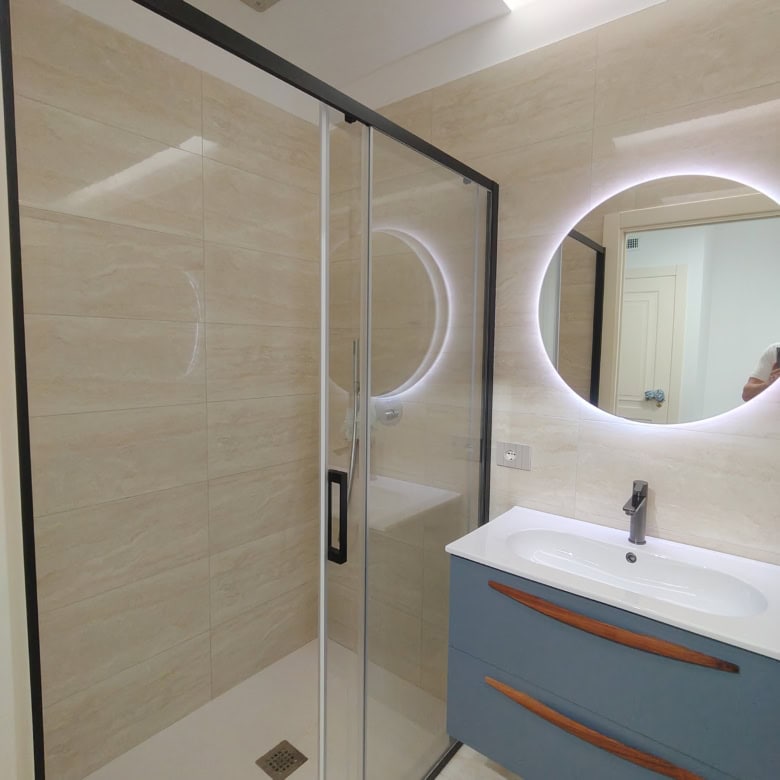 Luxury 2 Bed Townhouse Bathroom with Walk-In Shower in Bernalda Italy.