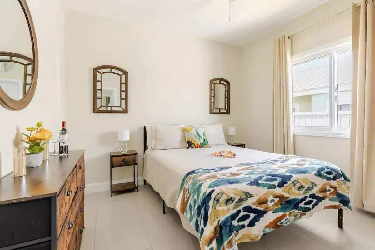 Elegant bedroom with vintage furniture and natural light.