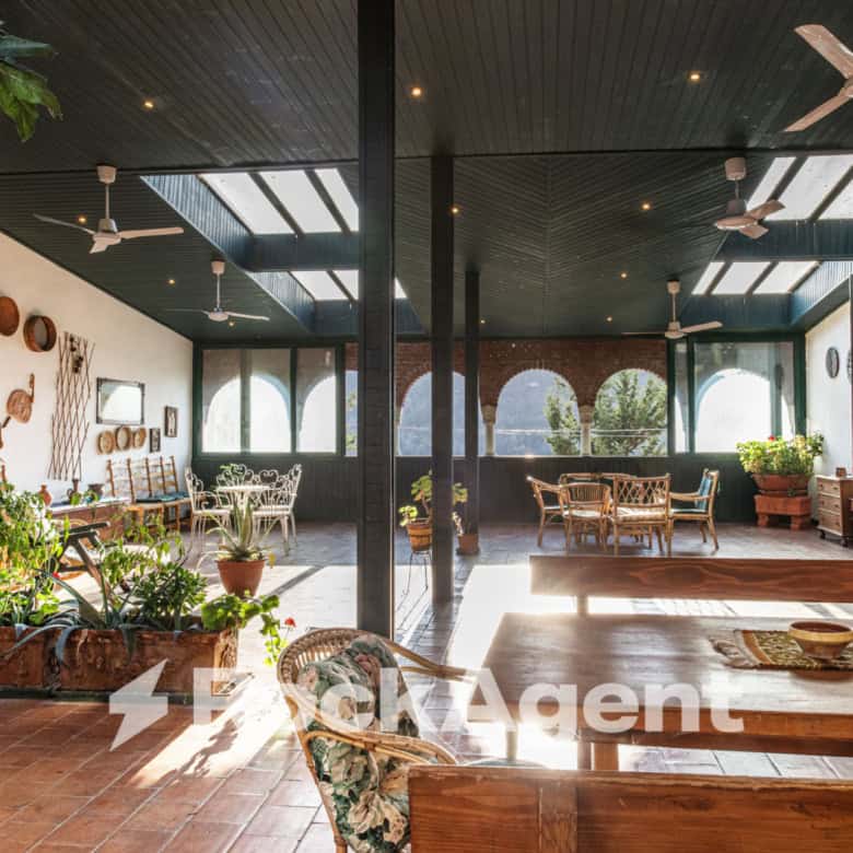 Elegant villa interior with spacious dining and living areas in Varzi, Italy.