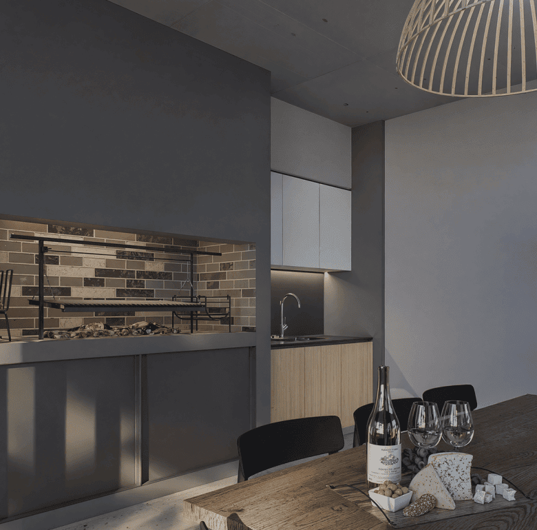 Modern dining space featuring a built-in outdoor grill and contemporary decor in Punta Del Este.