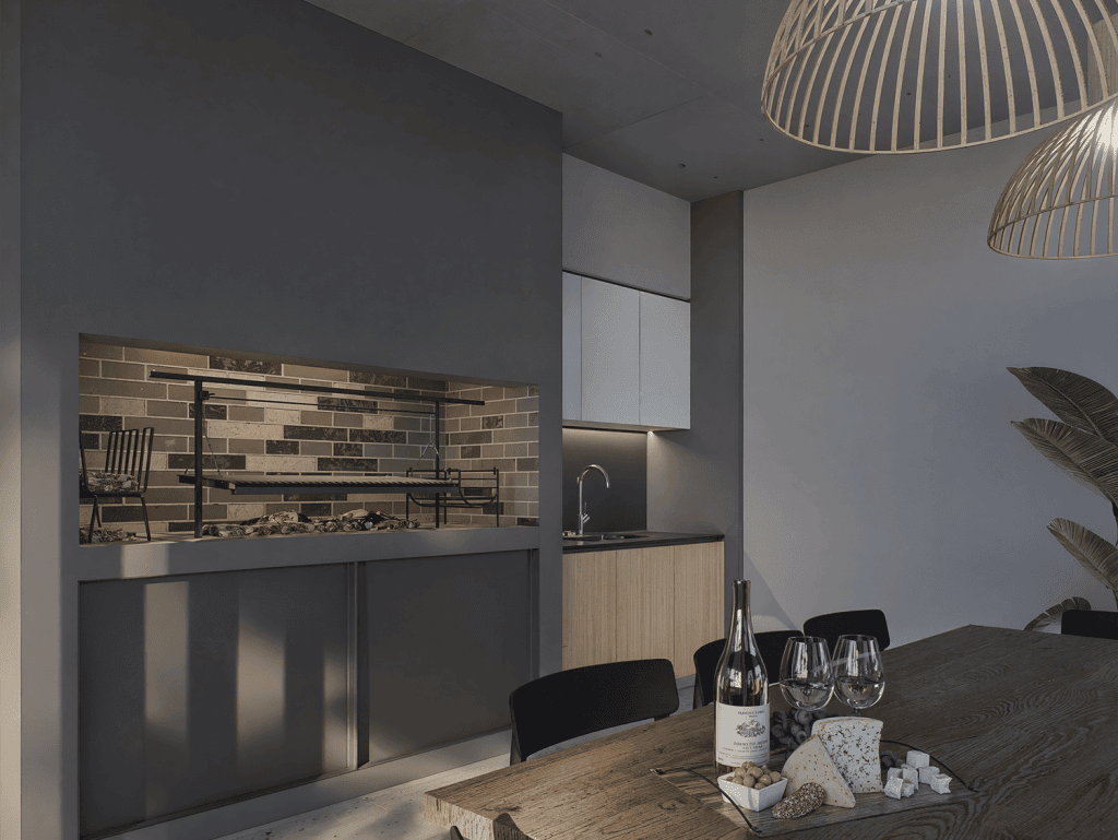 Modern dining space featuring a built-in outdoor grill and contemporary decor in Punta Del Este.
