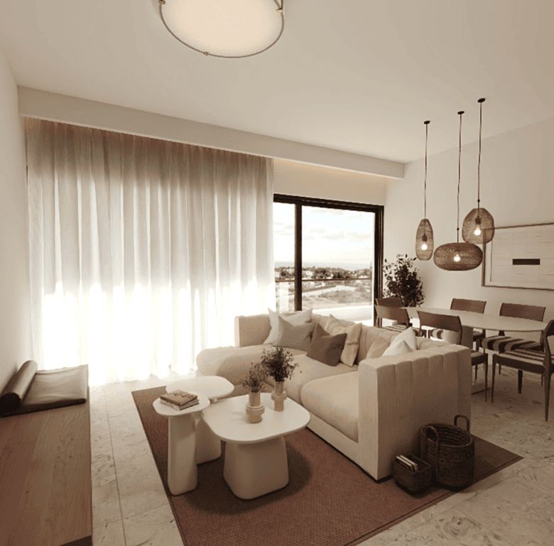 Bright Algarve living room with sea view, cozy furniture, and elegant interior design.