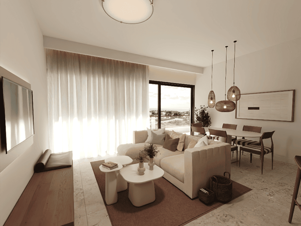 Bright Algarve living room with sea view, cozy furniture, and elegant interior design.