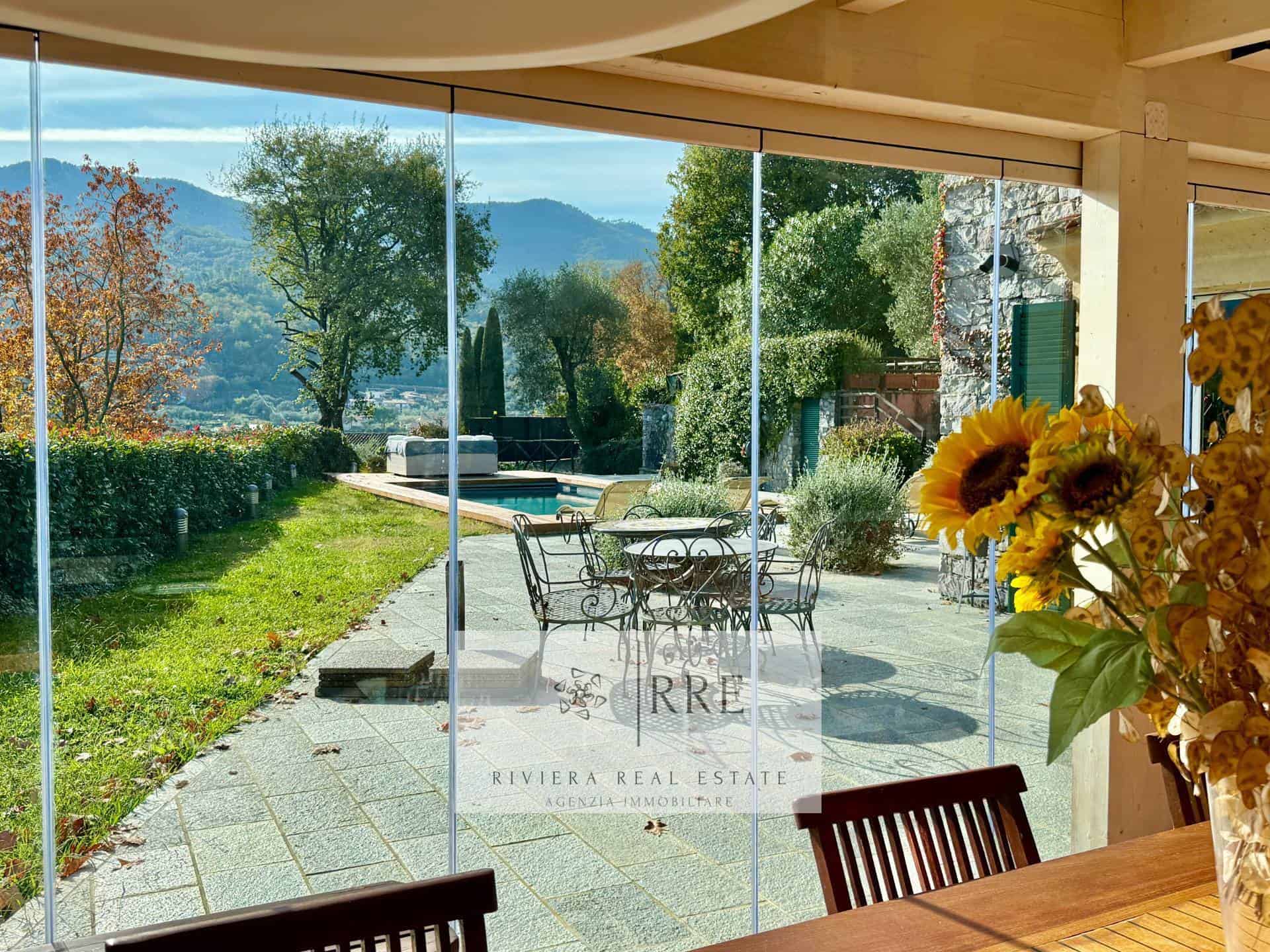 Beautiful outdoor space with panoramic mountain views and garden landscaping.