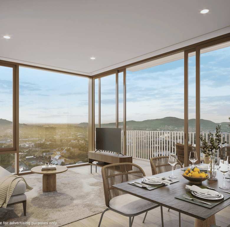 Hua Hin apartment featuring large glass windows with panoramic views of the surrounding landscape.