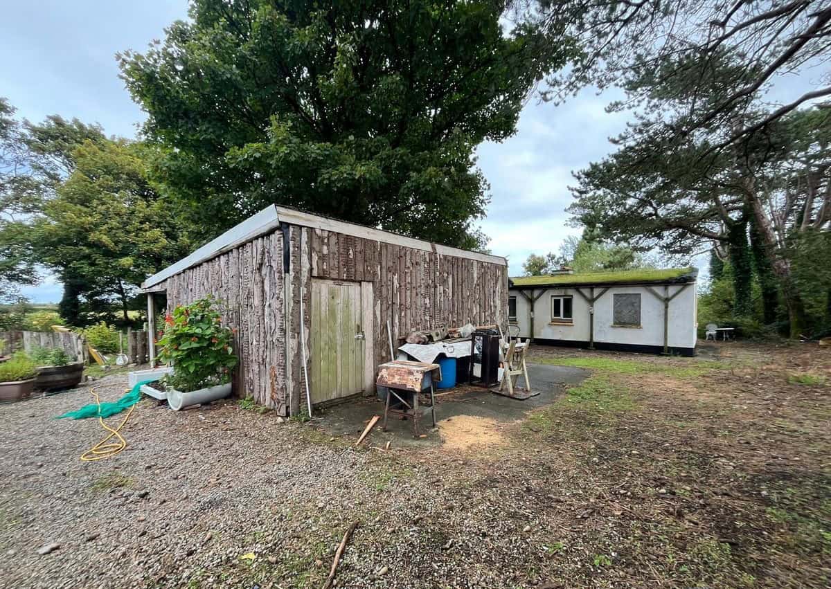Charming 2-bed Irish cottage for sale in Farranmacfarrell, Ballina, County Sligo, featuring a rustic.