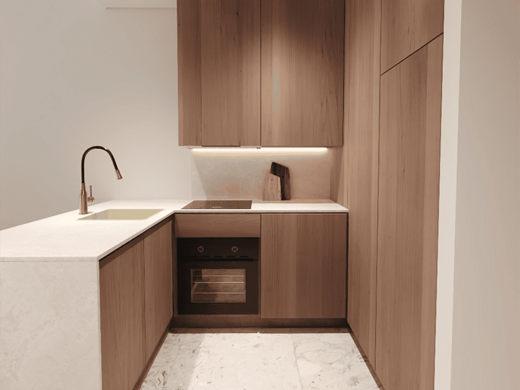 Contemporary Algarve kitchen featuring wooden cabinetry and sleek, minimalist style.
