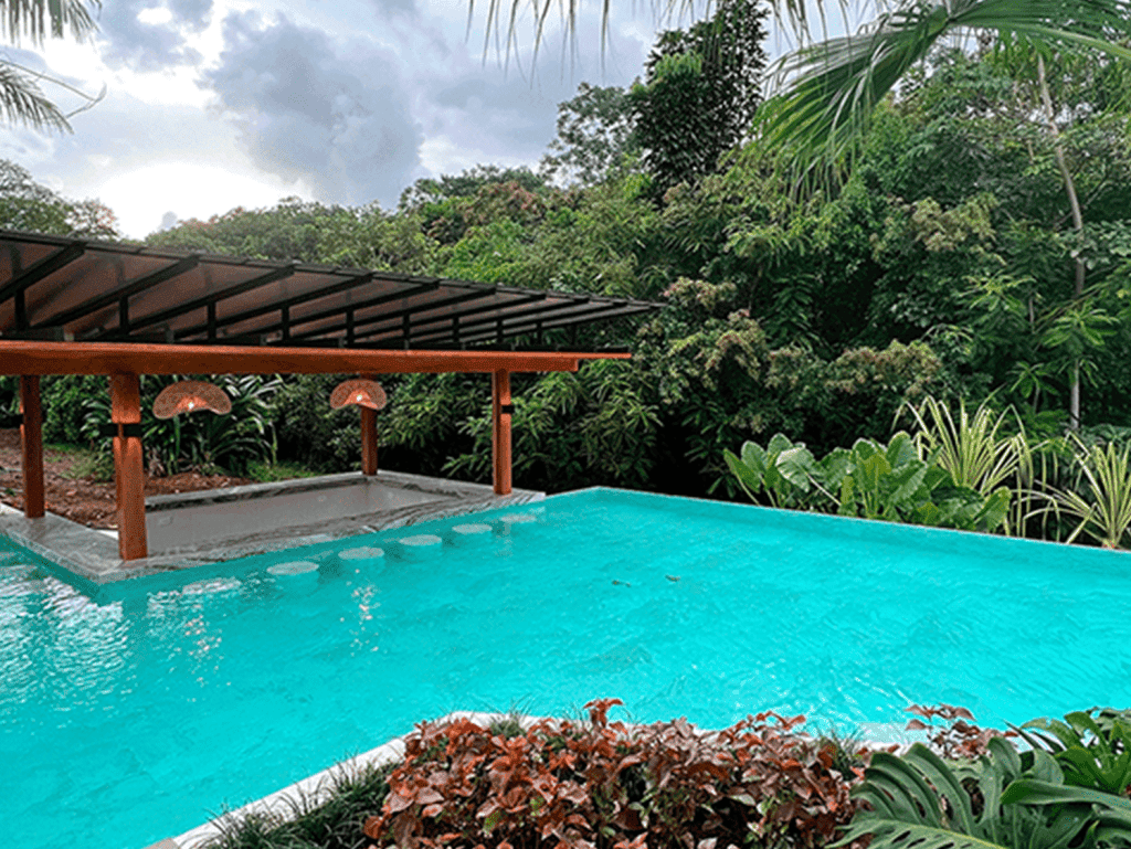 Pool with lush tropical surroundings in La Fortuna, Costa Rica.