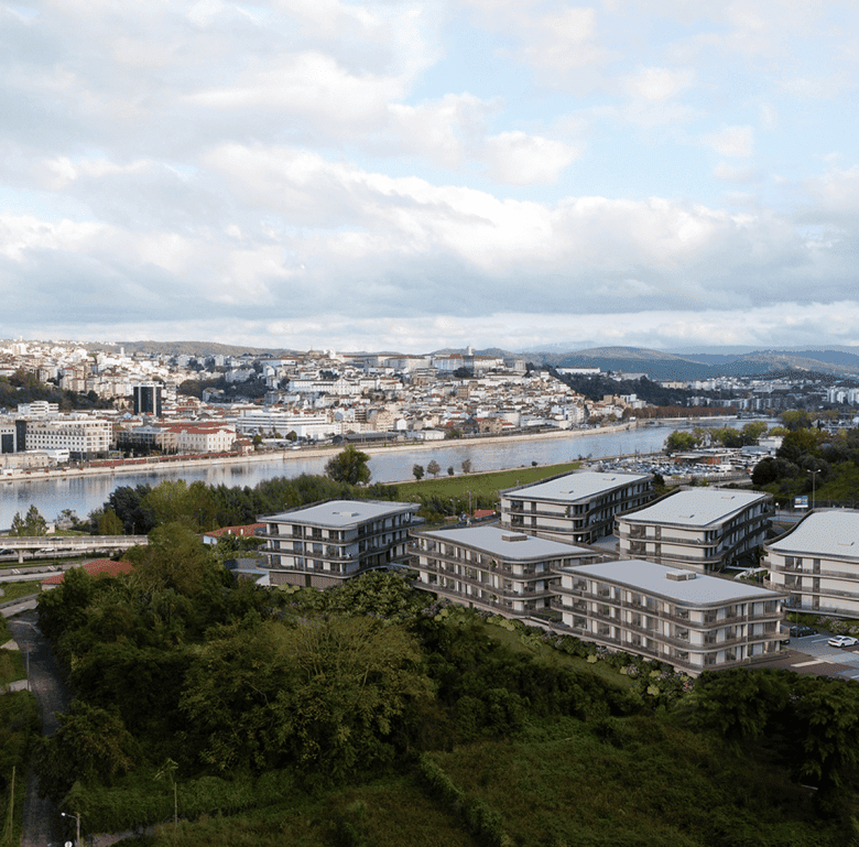 Heritage - Coimbra, Portugal: Modern residential buildings overlooking the river and cityscape.