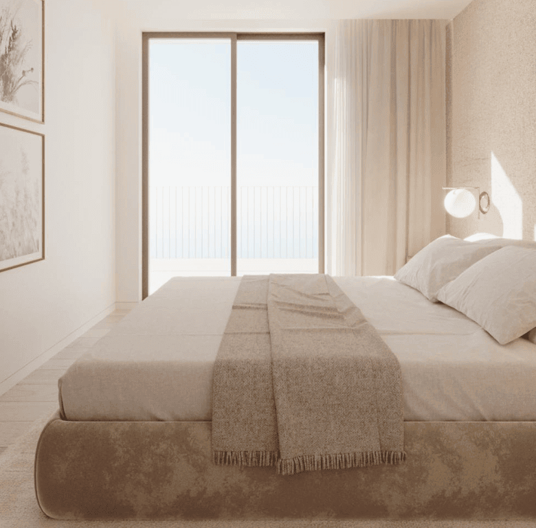 Sea view bedroom with large window and minimalist decor in Porto, Portugal.