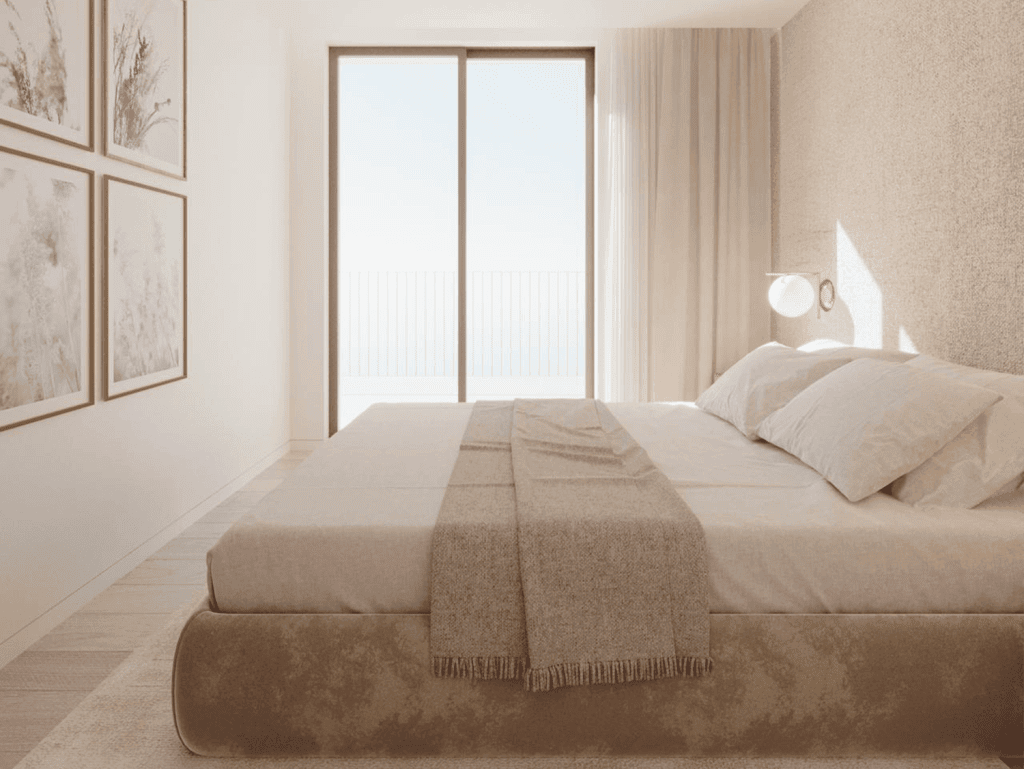 Sea view bedroom with large window and minimalist decor in Porto, Portugal.
