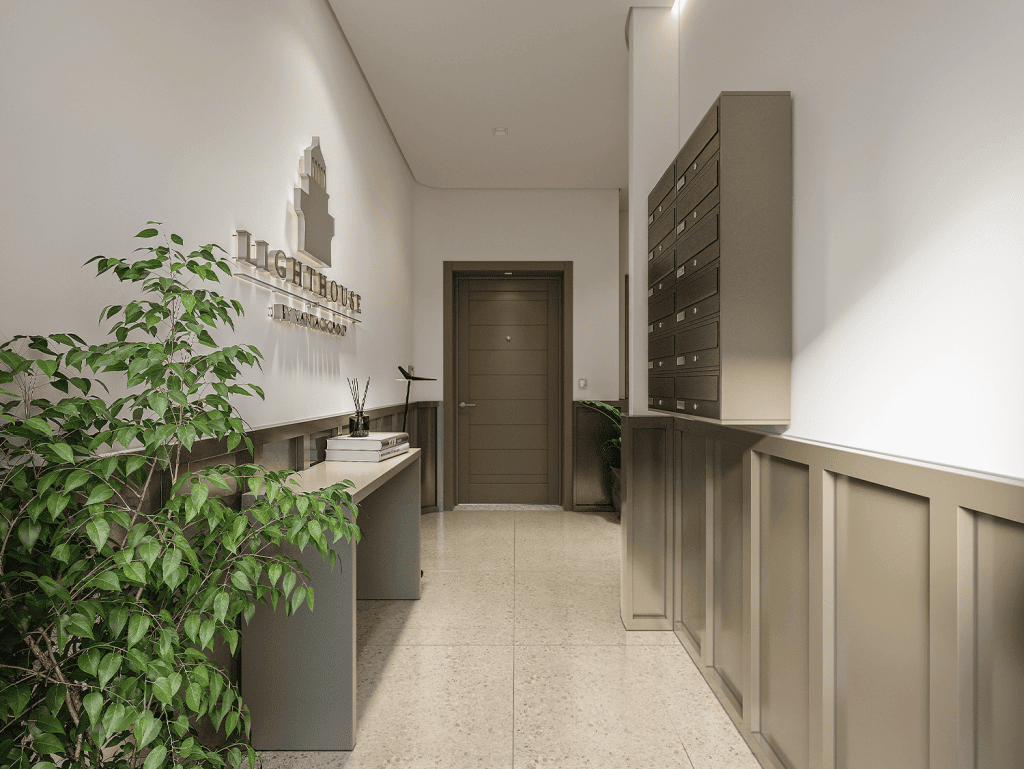 Modern apartment hallway with mailboxes, plants, and minimalist decor in Portugal.