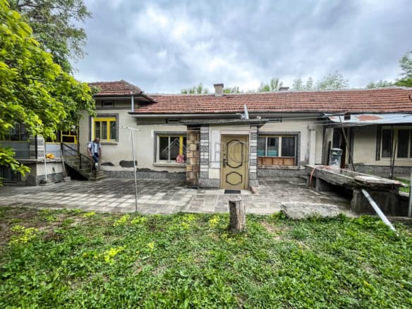 Traditional rural house for sale near Ruse with spacious garden and multiple outbuildings. Ideal for.