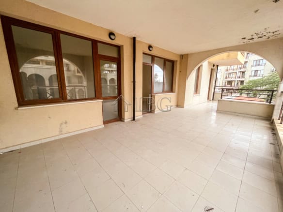 Balcony of a two-bedroom apartment at Lighthouse Golf Resort, Balchik, offering outdoor space and sc.