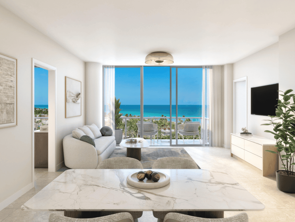 Ocean view living room in Miami apartment with modern furnishings and large windows.